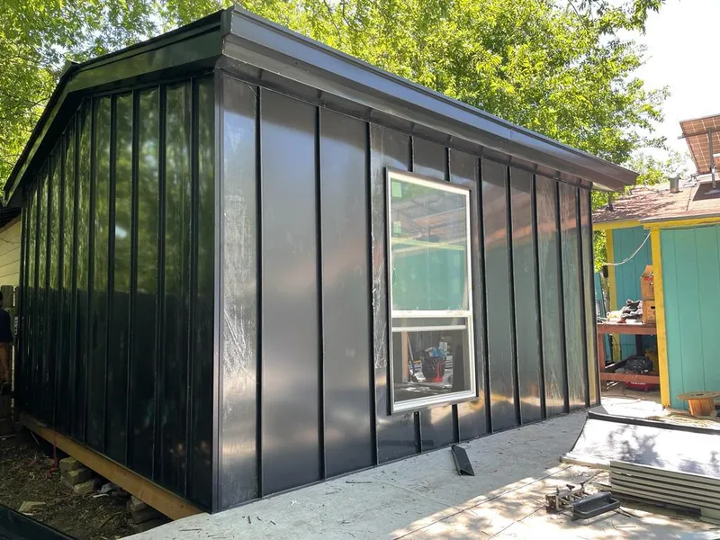 Black standing seam metal wall panels for Roof Inspection in Callaway